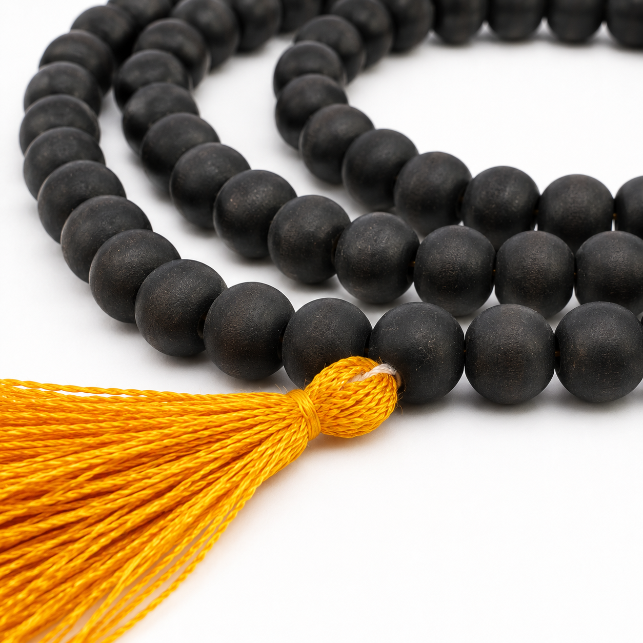 Close-up of Natural Karungali Ebony Wood Beads Showing Matte Finish and Premium Craftsmanship